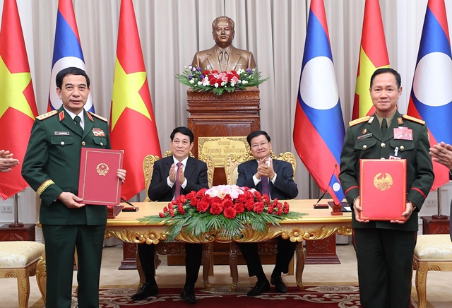 Vietnam, Laos to raise bilateral trade to $5 billion: Leaders