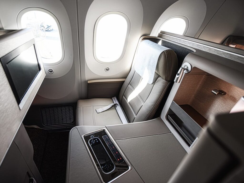 I never thought I’d pay extra for business class — now I swear by the upgrade’s incredible value