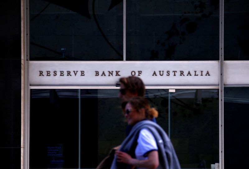 Australia central bank warns global trade war a major downside risk to economy