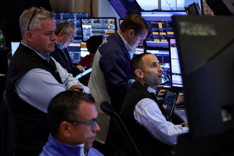 Wall St futures slip after tech selloff; earnings, Fed meet in focus