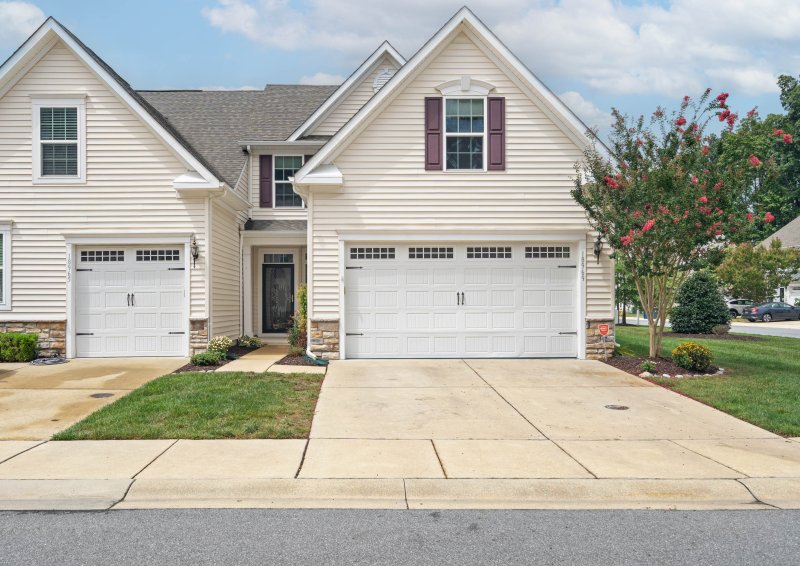 JUST SOLD! The Perfect Blend of Comfort, Convenience, and Coastal Lifestyle. End-Unit Townhome With A Two-Car Garage.