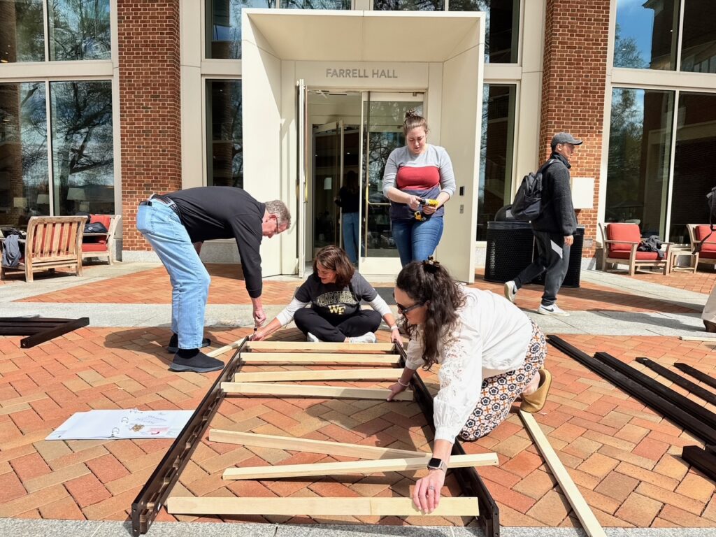 Business Professor Douglas Johnson integrates service in leadership course