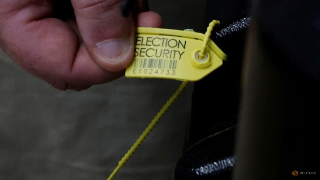 US tells election officials to be on guard against AI-powered tricks ahead of midterms